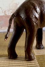 Load image into Gallery viewer, Vintage leather striding elephant sculpture
