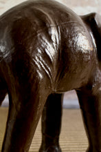 Load image into Gallery viewer, Vintage leather striding elephant sculpture

